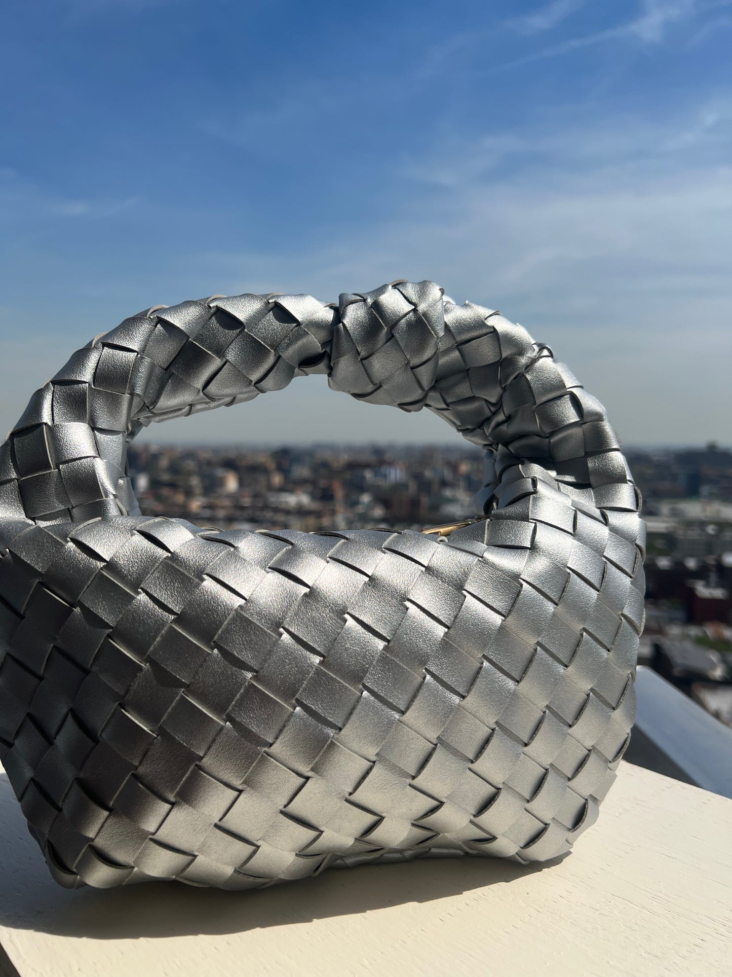 Jada silver clutch bag