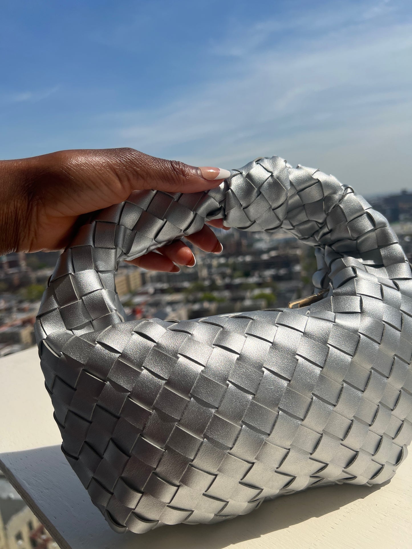 Jada silver clutch bag