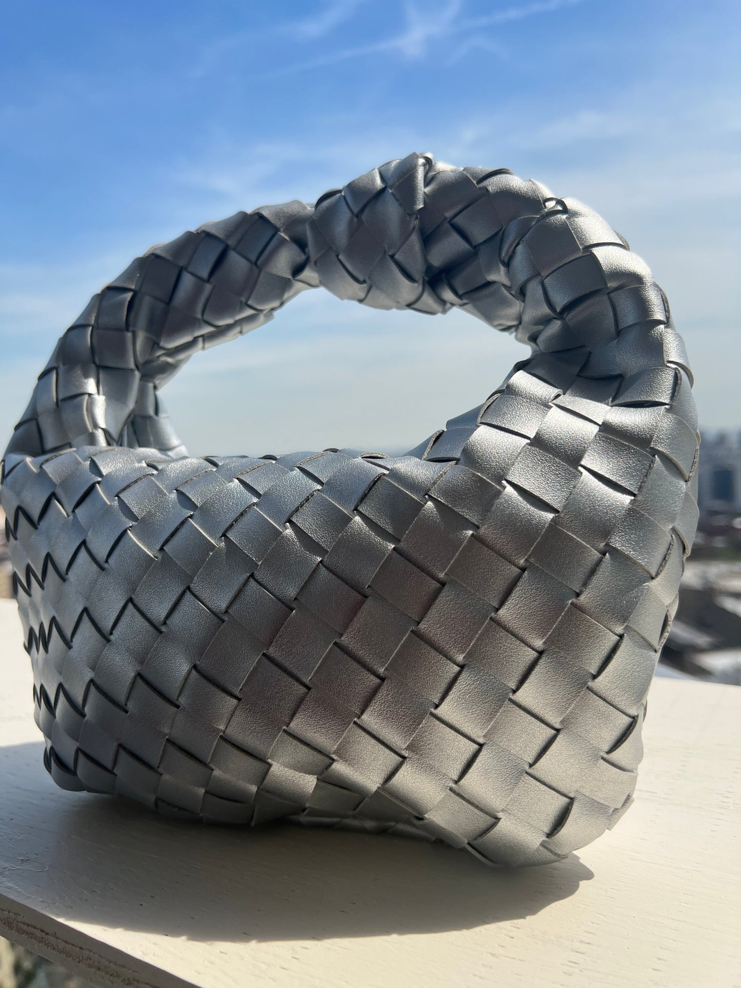 Jada silver clutch bag